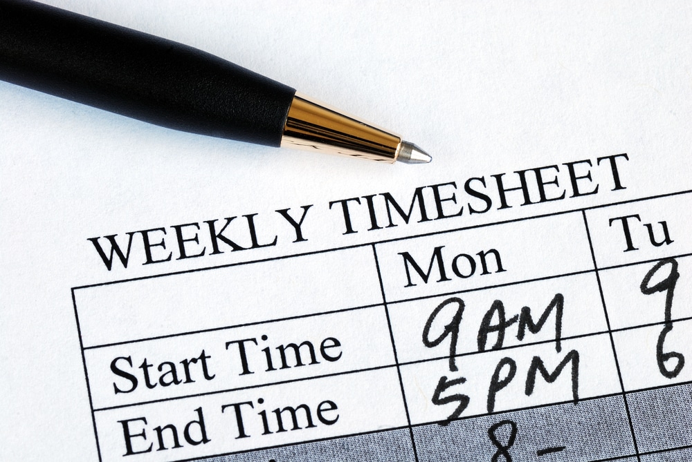 A weekly timesheet featuring a pen, designed to help individuals "Get Out of the Rat Race.
