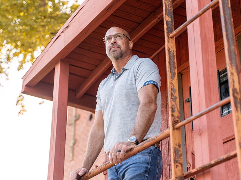 a man standing in the balcony