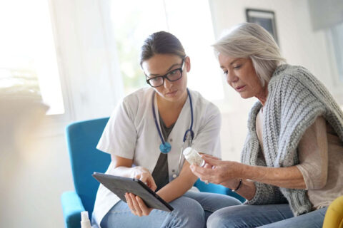 A doctor talking to a women