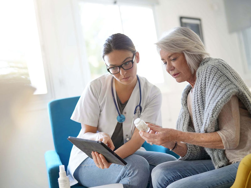 A doctor talking to a women