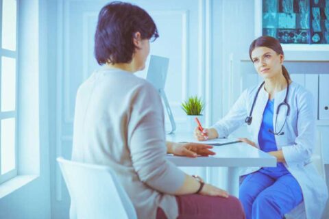 Dentist having a meet with patient