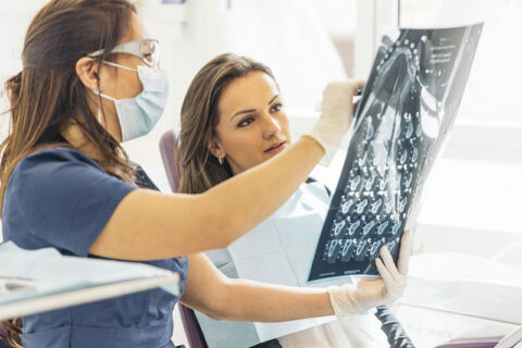 A doctor talking to a women