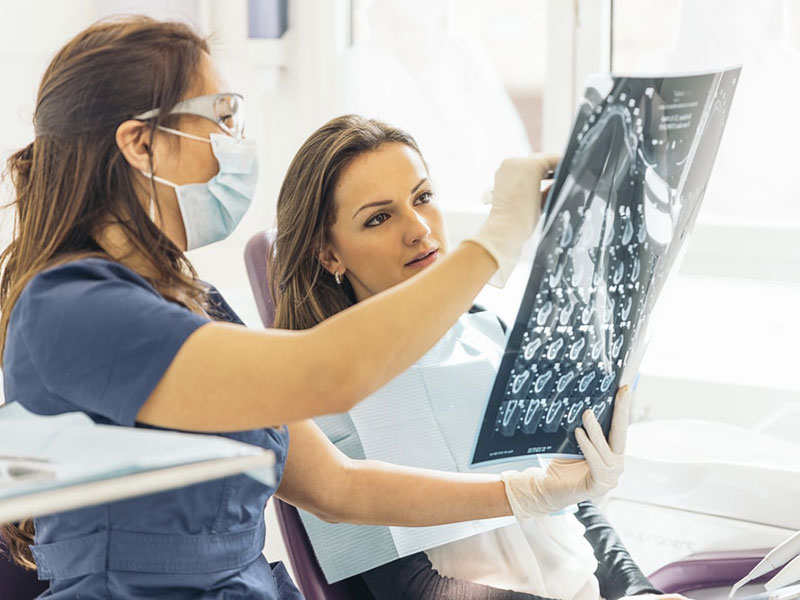 A doctor talking to a women