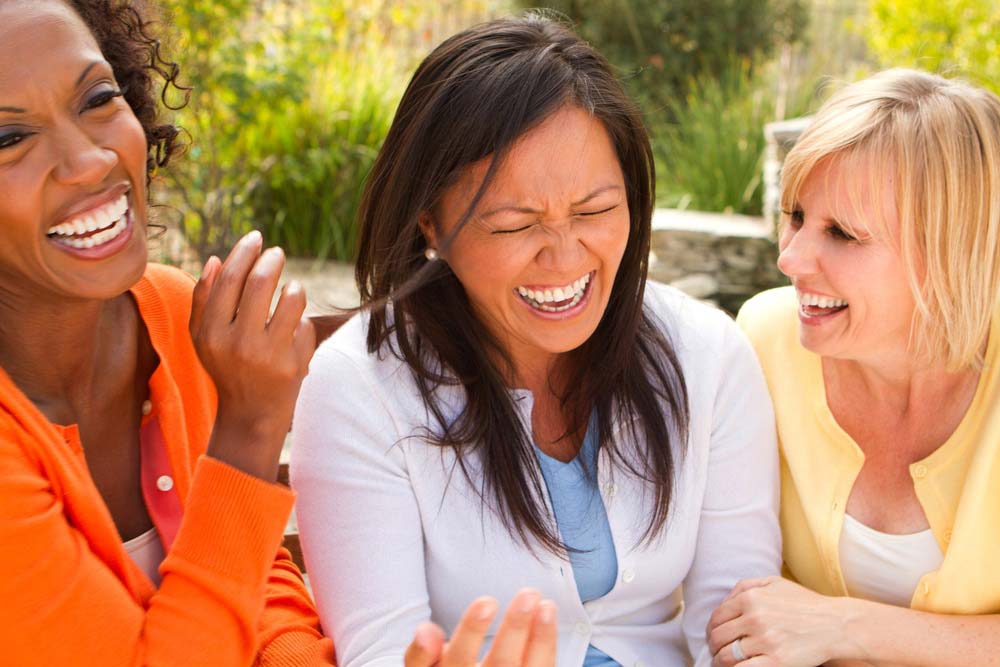 a group of women laughing