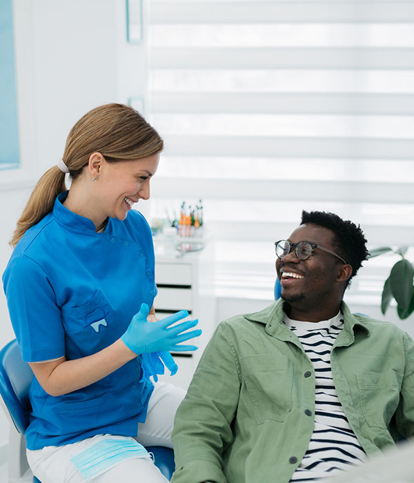 happy man smiling at the dentist